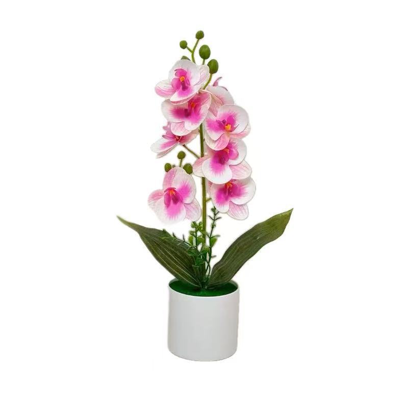 Dekorative künstliche Orchideenarrangement für Tischdeko