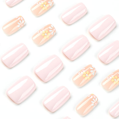 Kunstvolle Nagelverlängerungen mit Blumenverzierungen Brehn