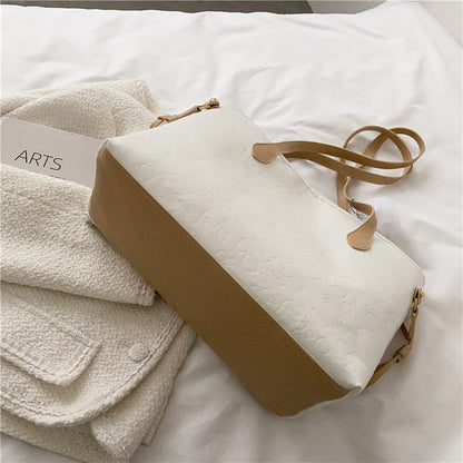 Stylische Präge-Schultertasche