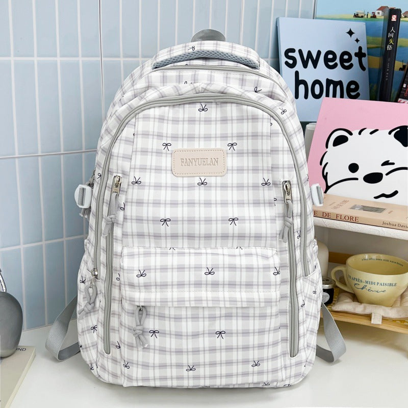 Süßer Rucksack mit Schleifenmuster