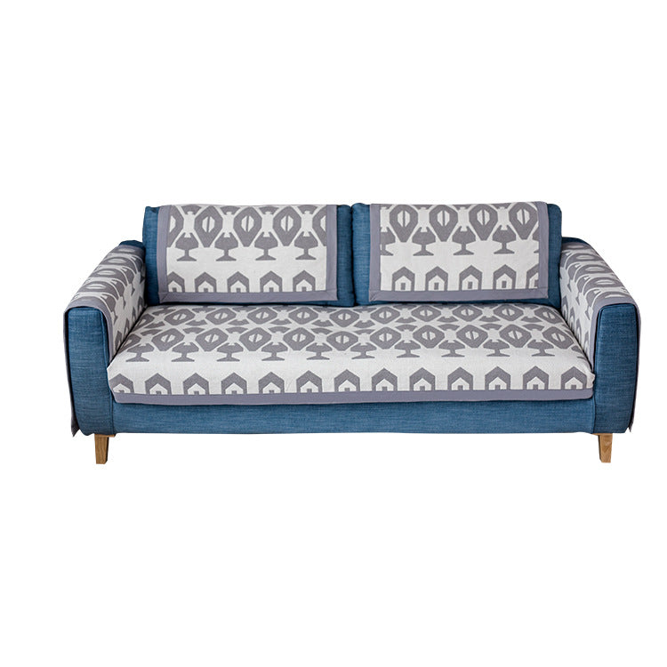 Universelle Sofa-Schutzauflage für Dreisitzer mit Blätter-Print, rutschfester Unterseite und separaten Armlehnenbezügen Brehn