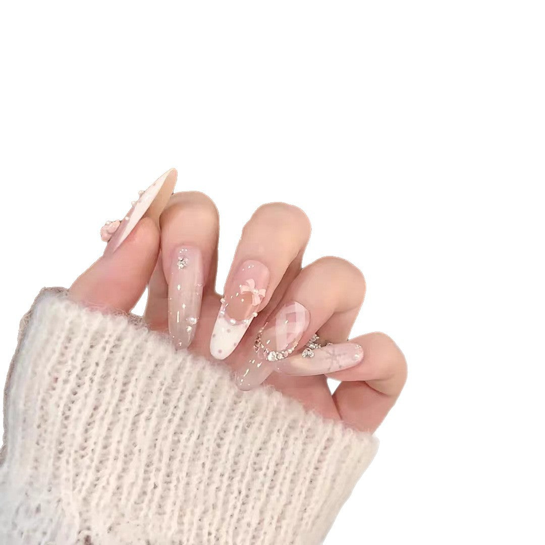 Künstlerisches Lang-Stiletto-Press-On-Nagelset mit dekorativen floralen Akzenten Brehn