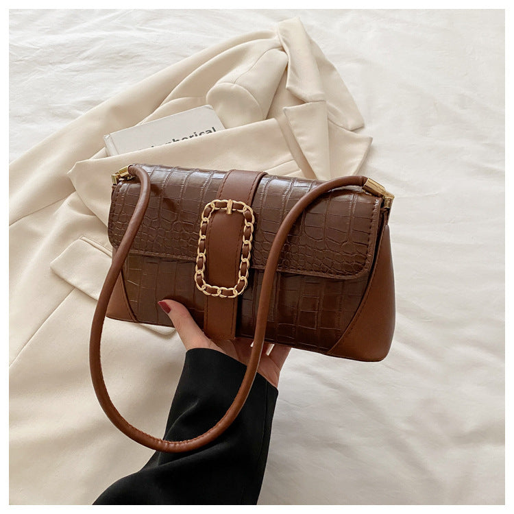 Krokodilmusterte Kettenriemen-Handtasche Brehn