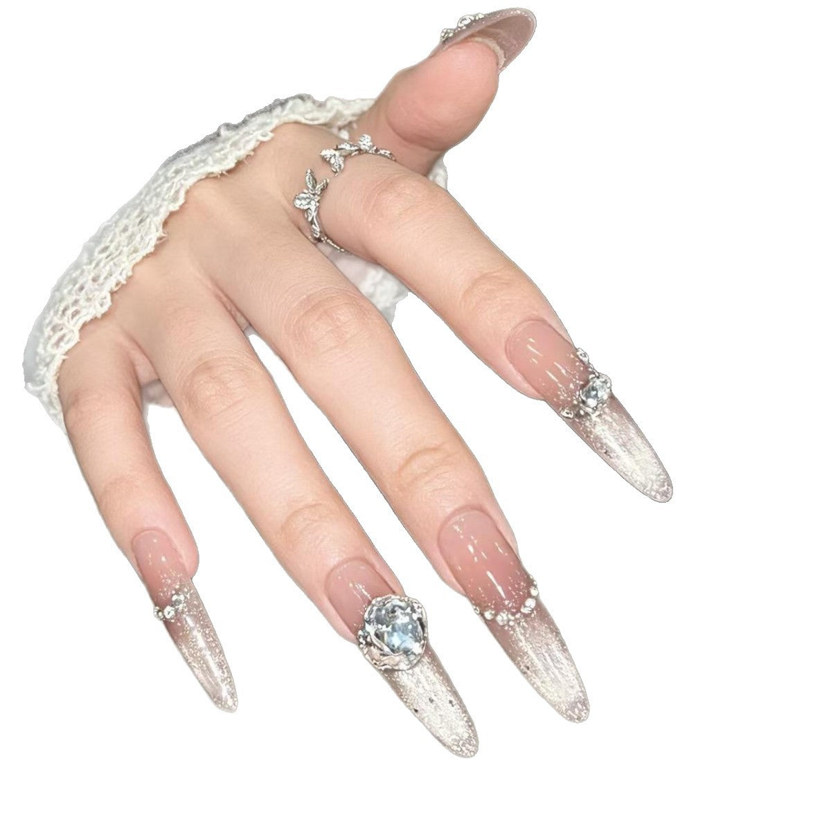Künstlerische Stiletto-Nagelverlängerungen mit Edelsteinakzenten