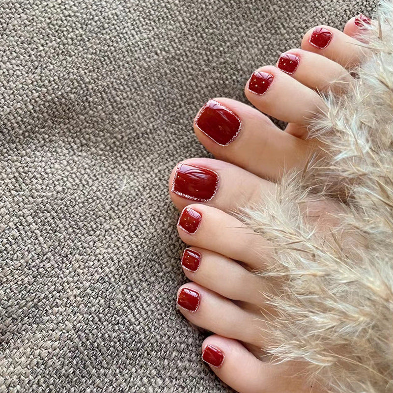 Kunstvolle Fußnagelkunst mit Strass- und Glitzerelementen Brehn