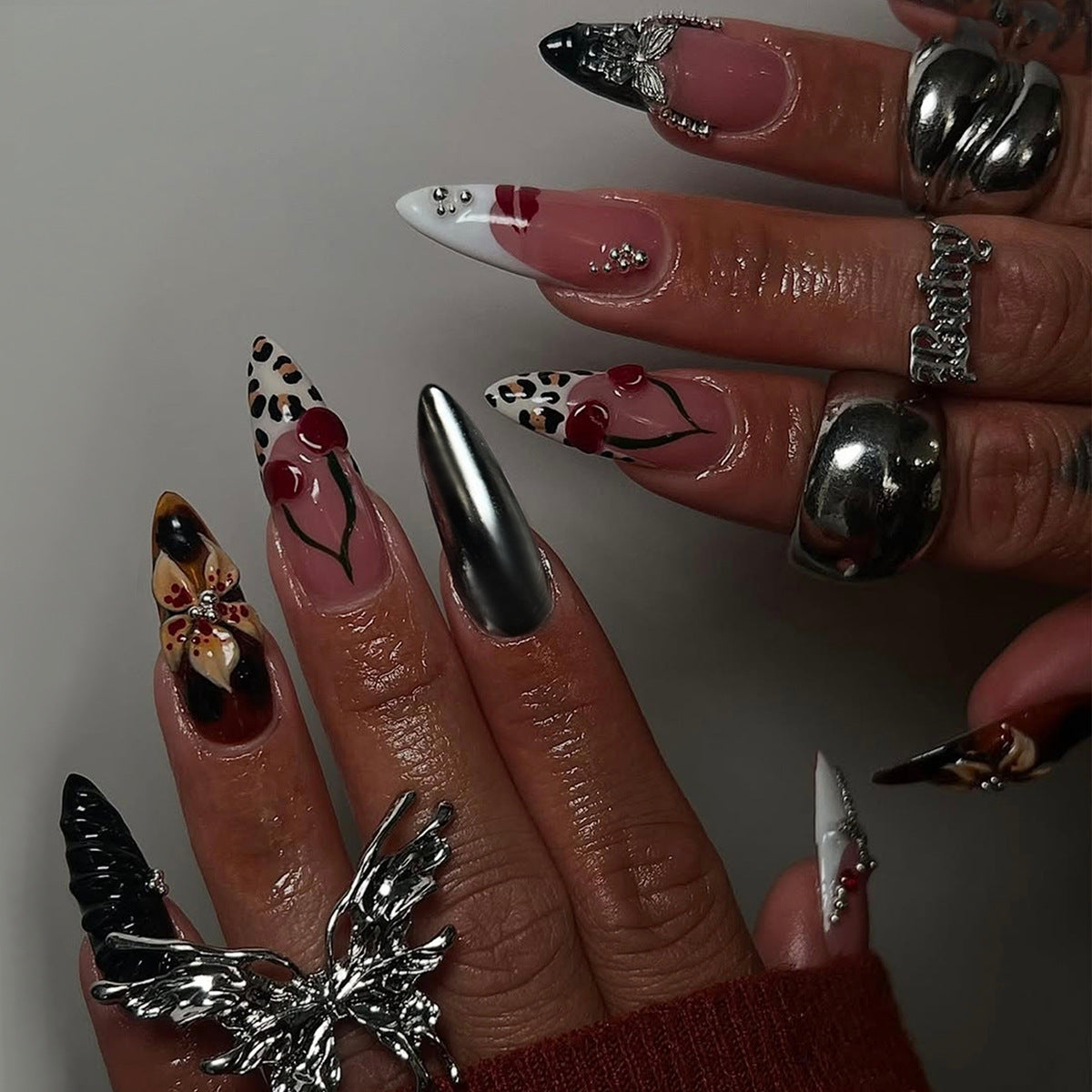 Kunstvolle Stiletto Fingernägel mit Einzigartigen Design-Elementen Brehn