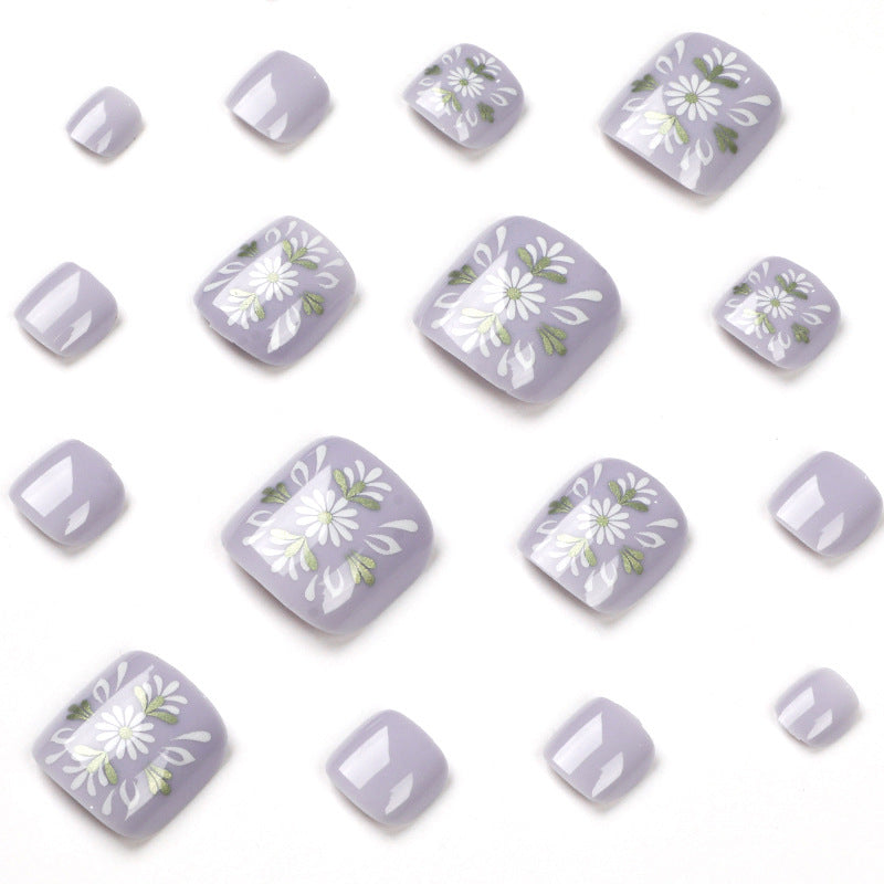 Kunstvolle Fußnagelgestaltung mit elegantem floralem Design Brehn