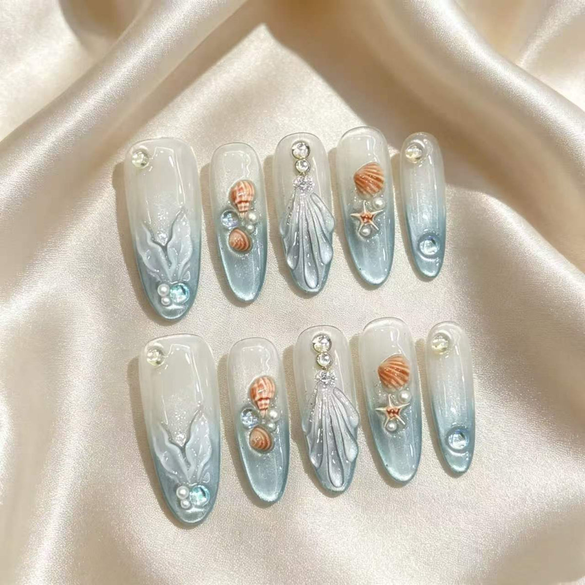 Dekorative Meer-inspirierte Press-On Nagelkunst