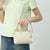 Adorable tierfreundliche Mini-Handtasche Brehn