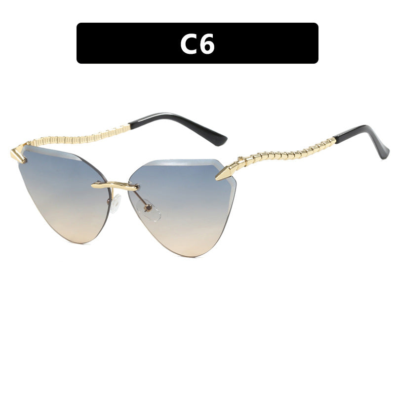 Damen Cat-Eye Sonnenbrille mit einzigartigem goldenen Rahmendesign und schützenden Gläsern Brehn