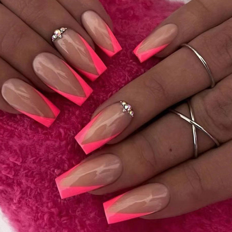 Kunstvolle Nagelverlängerungen mit Neon-Spitzen und Strassverzierung Brehn