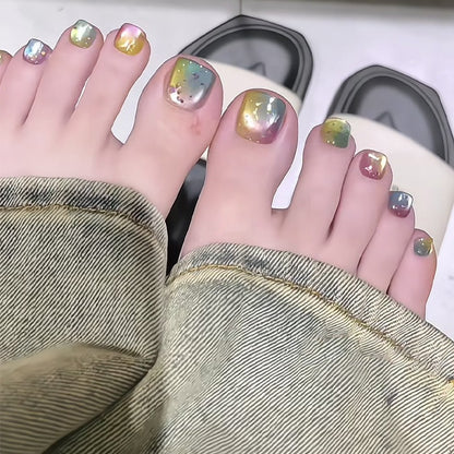 Kunstnagelset mit schimmerndem Farbverlauf und eleganten Designs Brehn