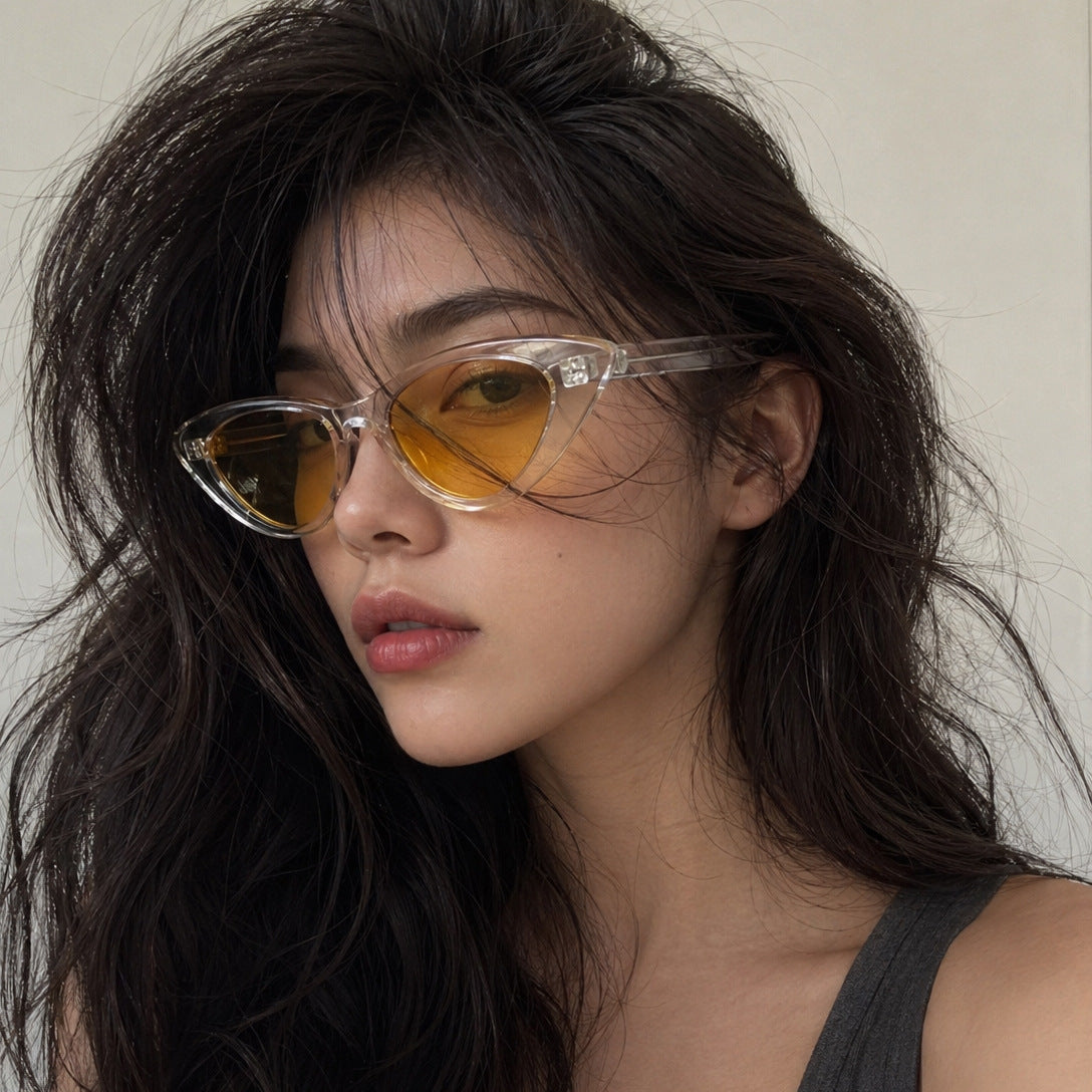 Damen Cat-Eye Sonnenbrille mit transparenter Rahmenkonstruktion und gelben Gläsern Brehn