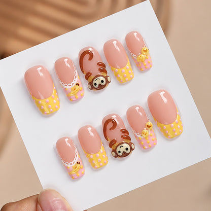Kunstnagelset mit verspielten Tiermotiven und eleganten Verzierungen Brehn