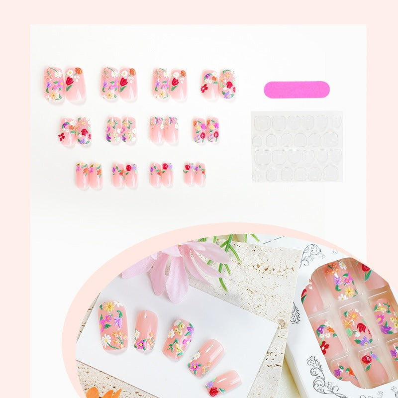 Kunstnagelset mit Blumenmotiven und Glitzerakzenten Brehn