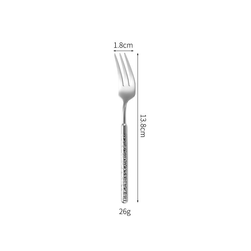 Eleganter Dessertlöffel mit Kunstvollem Griffdesign Brehn