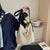 Handtasche mit Genieteten Details Brehn