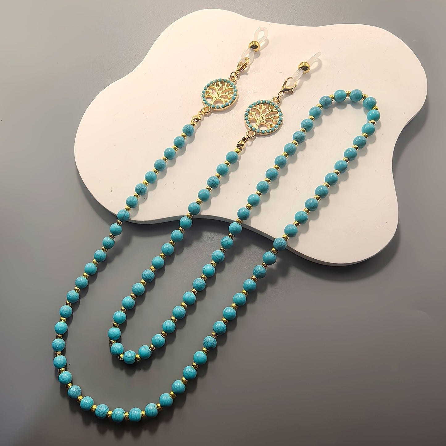 Elegante Perlenbesetzte Brehn