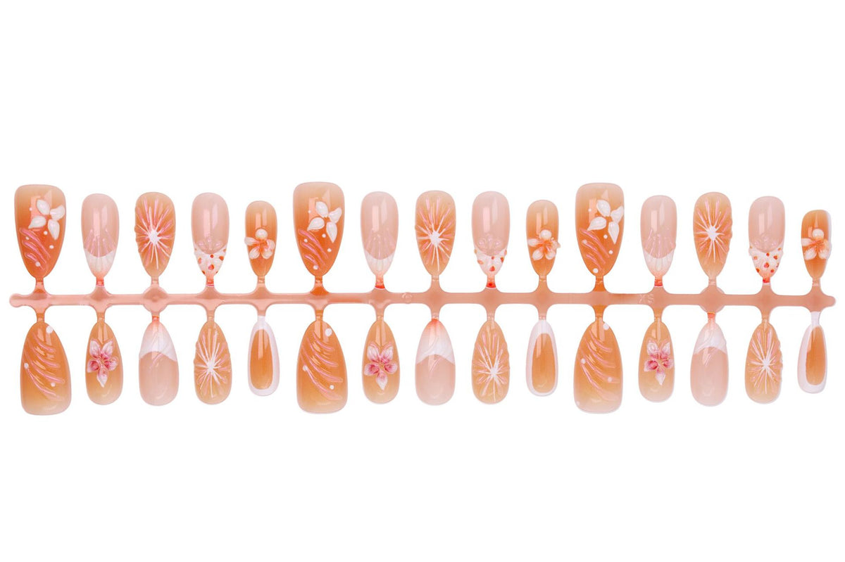 Kunstnagelset mit floralen Akzenten und elegantem Ombre-Effekt Brehn