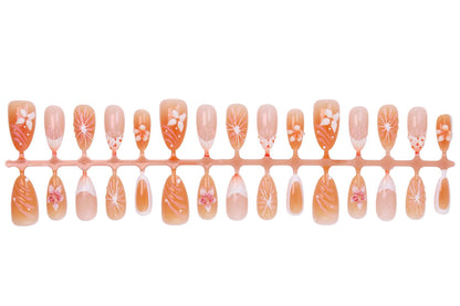 Kunstnagelset mit floralen Akzenten und elegantem Ombre-Effekt Brehn