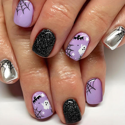 Halloween Kunstnagelset mit spooky Motiven und Glitzerakzenten Brehn