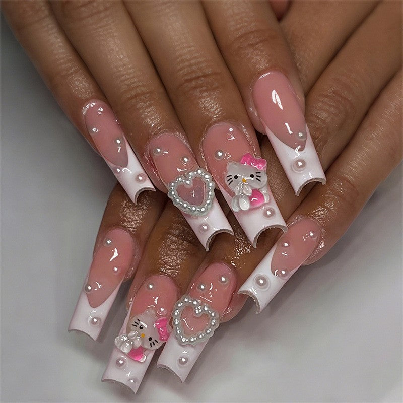 Glamouröses Kunstnagelset mit funkelnden Strassverzierungen und kreativen Tiermotiven Brehn