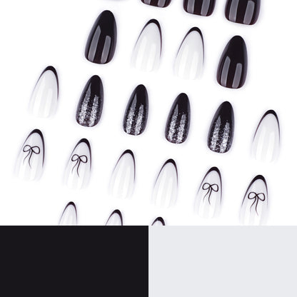 Kunstvolle Nagelkunst mit elegantem Schleifenmuster und Glitzer akzenten Brehn