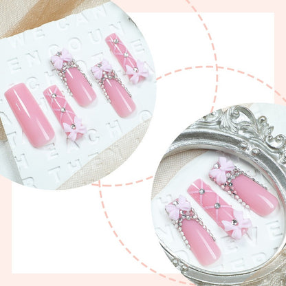 Kunstnagelset mit eleganten Schleifen- und Glitzerakzenten Brehn