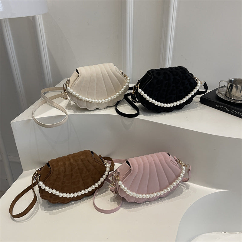 Elegante muschelförmige Umhängetasche Brehn
