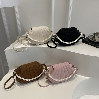 Elegante muschelförmige Umhängetasche Brehn