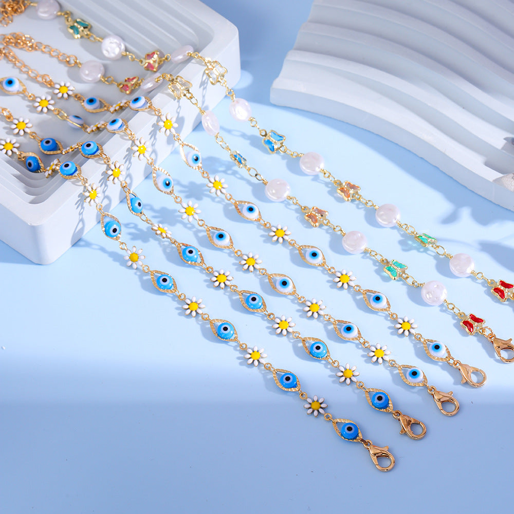 Eye Charm und Daisy Armband Brehn