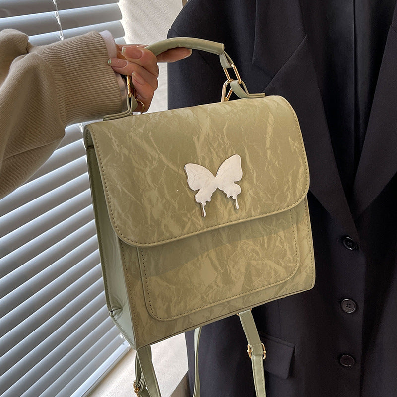 Schmetterlingsverzierte Handtasche
