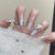 Glamouröse Stiletto Press-On Nagelset mit Strassverzierungen Brehn