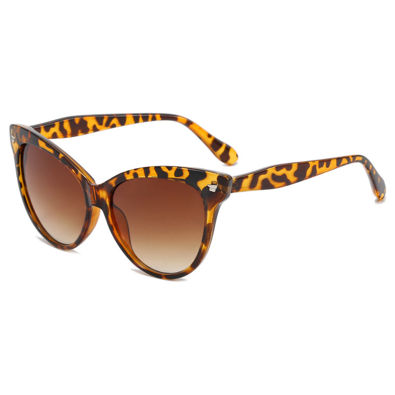 Damen modische Cat-Eye Sonnenbrille mit transparentem Rahmen und blauen Gläsern Brehn