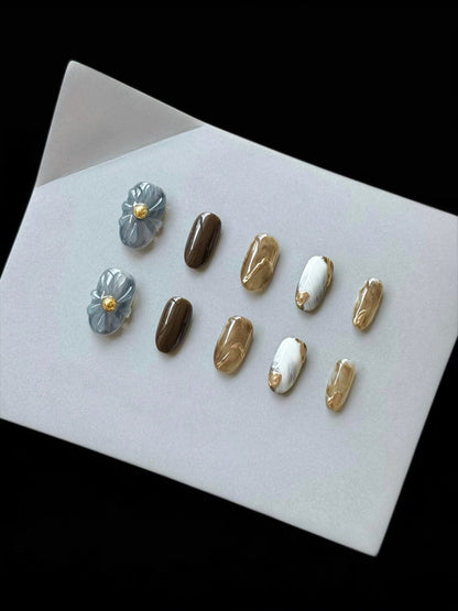 Künstlerisches mit Blumenakzenten verziertes Press-On-Nagel-Set