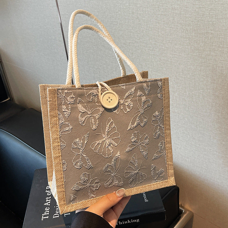 Schmetterling bestickte Stofftasche