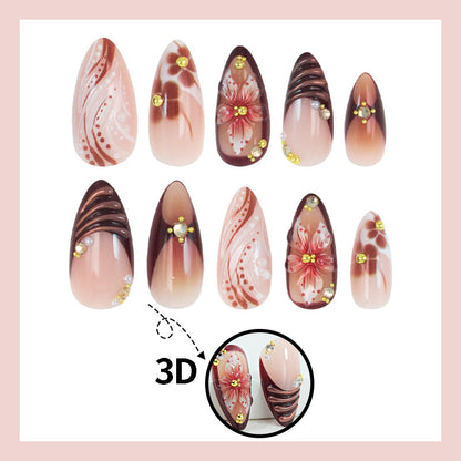 Kunstnagelset mit 3D-Blütenverzierungen und eleganten Mustern Brehn