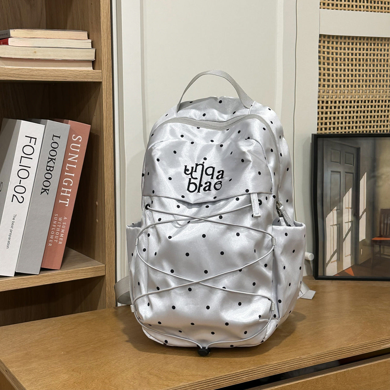 Eleganter gepunkteter Schulrucksack