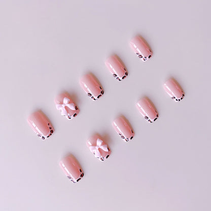 Kunstnagelset mit elegantem Leopardenmotiv und niedlichen Schleifen Brehn