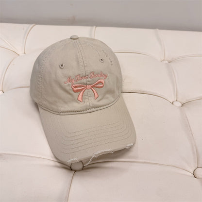 Damen Distressed Baumwoll-Baseballmütze mit Schleifenstickerei Brehn