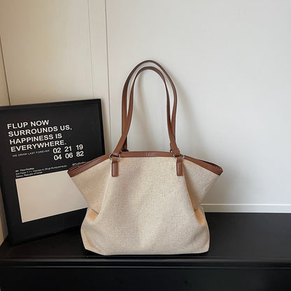 Vielseitige Canvas-Tote-Tasche mit Lederakzenten