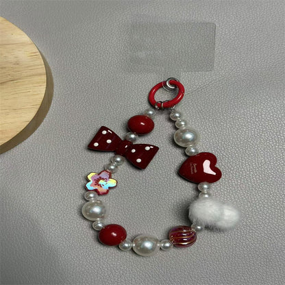 Verspielter Bow and Heart Schlüsselanhänger Brehn