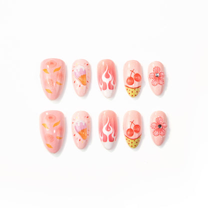 Künstlerische dessertthematische Press-On Nail Art Brehn