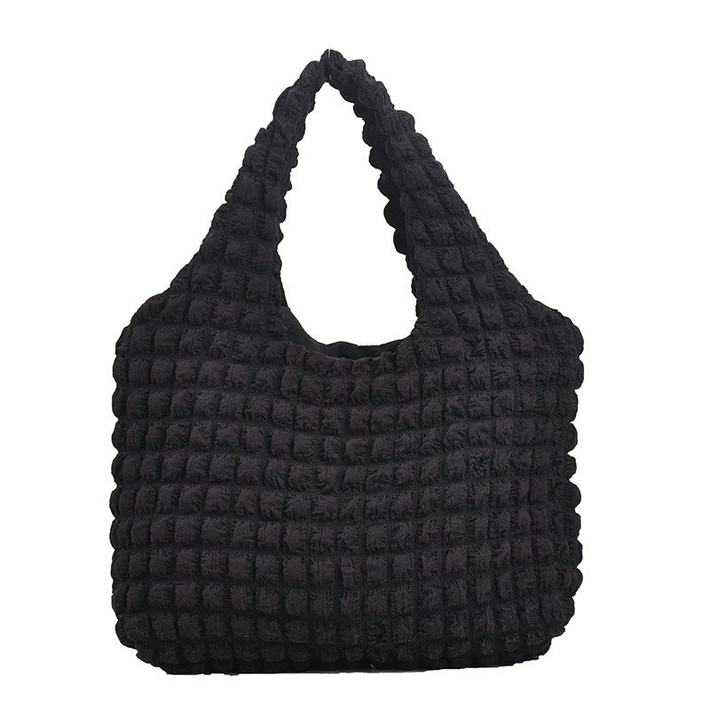 Gemütliche strukturierte Schultertasche