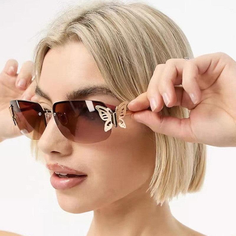Damen modische Sonnenbrille mit filigranem Schmetterlingsdesign und schützenden Gläsern Brehn