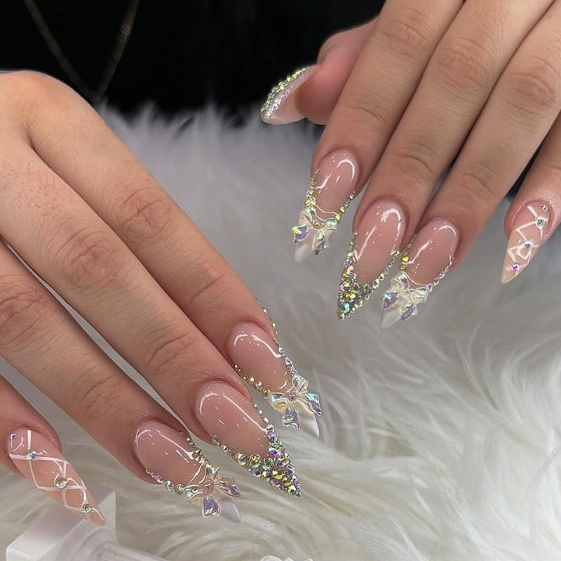 Kunstnagelset mit Glitzer- und Schleifenmotiv Brehn