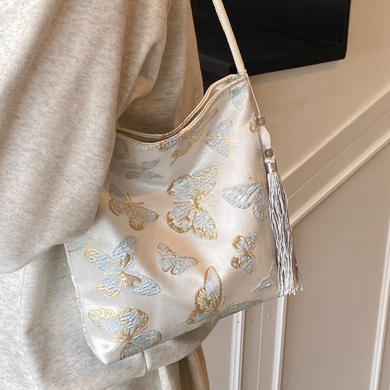 Elegante floral bedruckte Handtasche