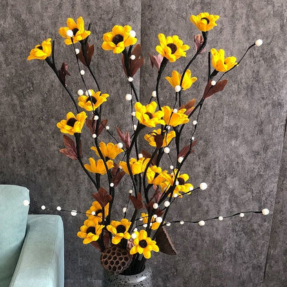 Lebensechte dekorative Blumenarrangement