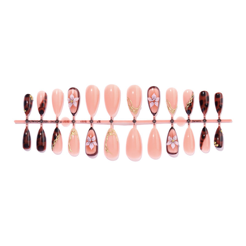 Künstlerisches Press-On-Nagelset mit eleganten Blumen- und abstrakten Designs Brehn