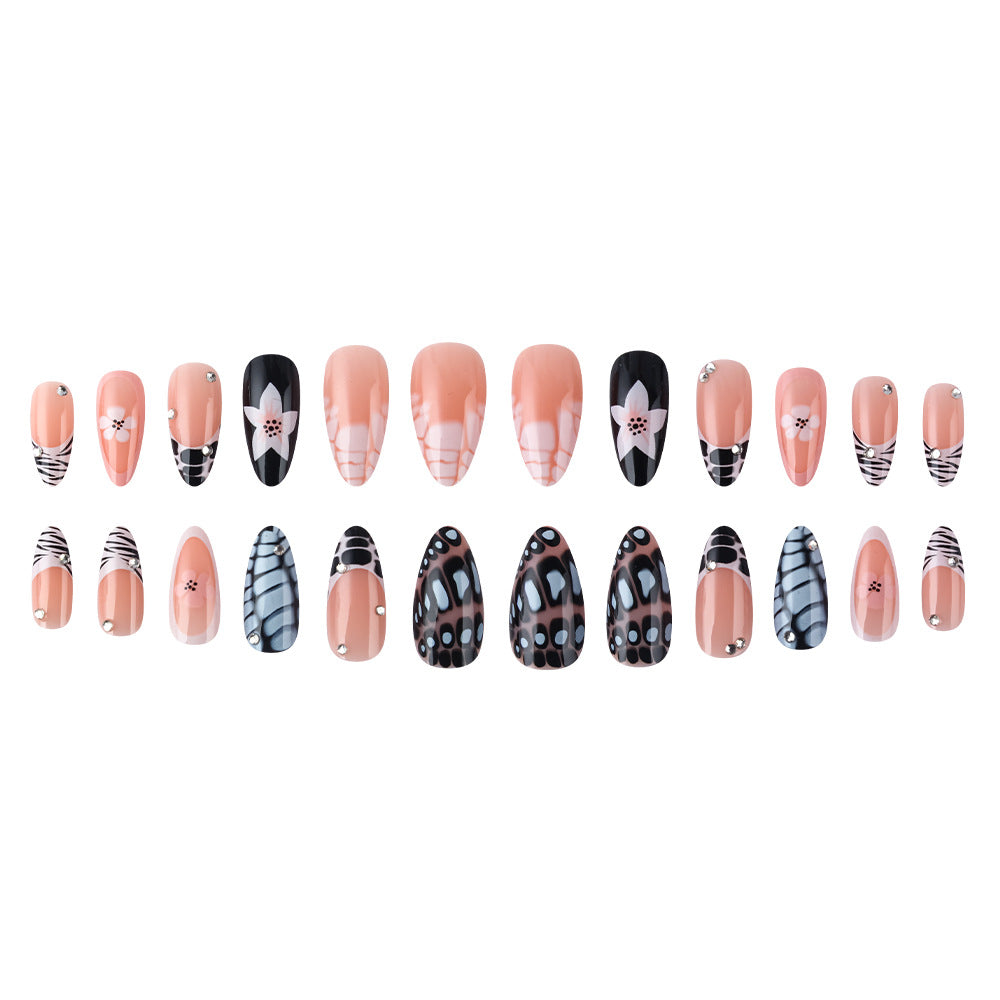 Künstlerisches Press-On Nagelset mit floralem und texturiertem Design Brehn